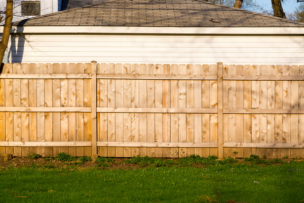 How to Install Wood Fence Panels | DoItYourself.com