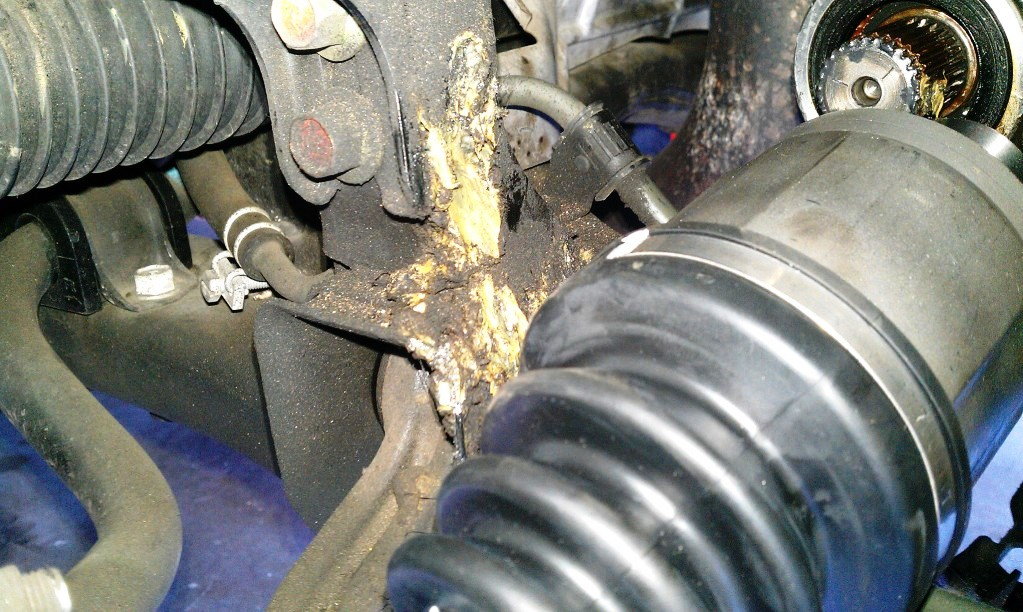 Popping the axle free from the transmission seal requires a little wiggling and pulling