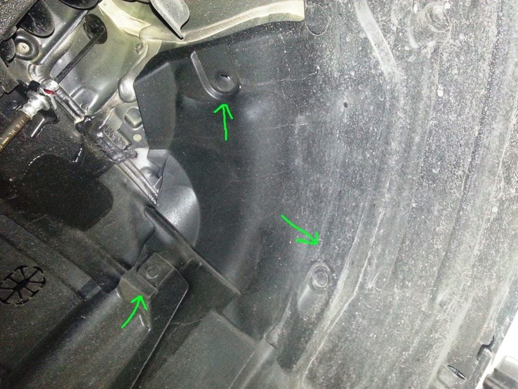 Snap connectors in the passenger side fender liner