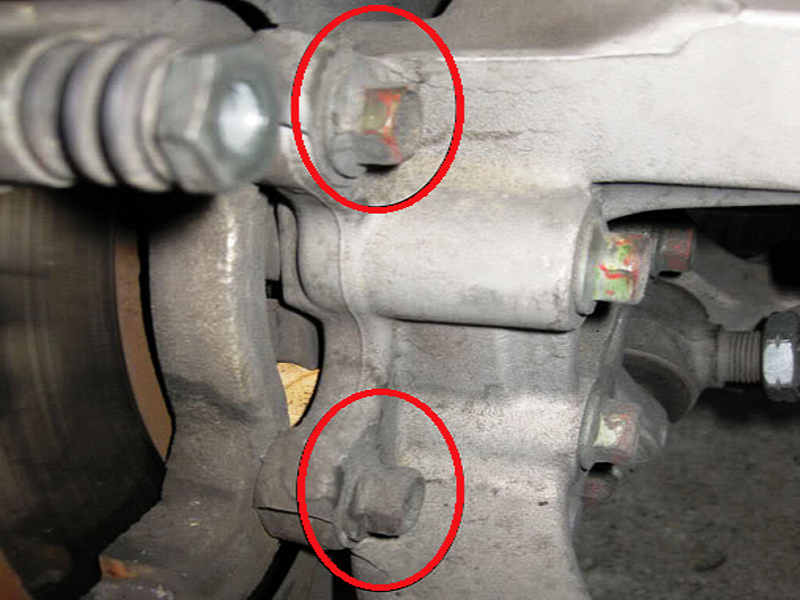 Caliper bracket bolts (inboard side of brake rotor)