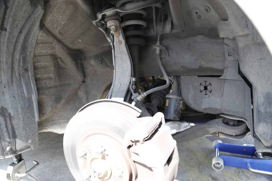 Acura TL suspension problem noise ride issue fix diagnose shocks strut bushing alignment