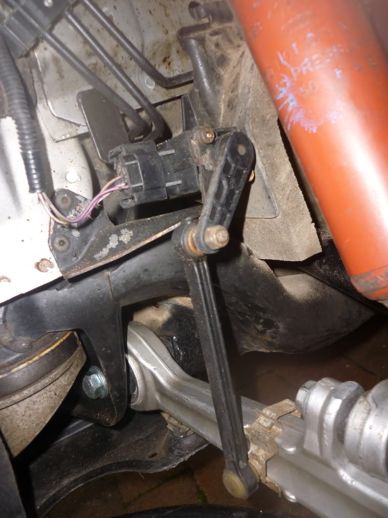 Check the self-leveling sensor on the lower control arm.