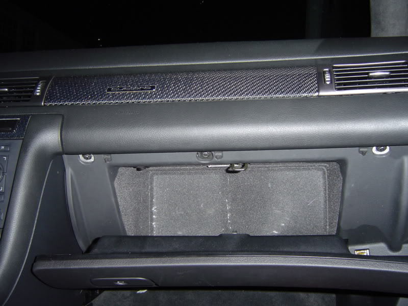 Remove the five bolts holding the glove box in place.