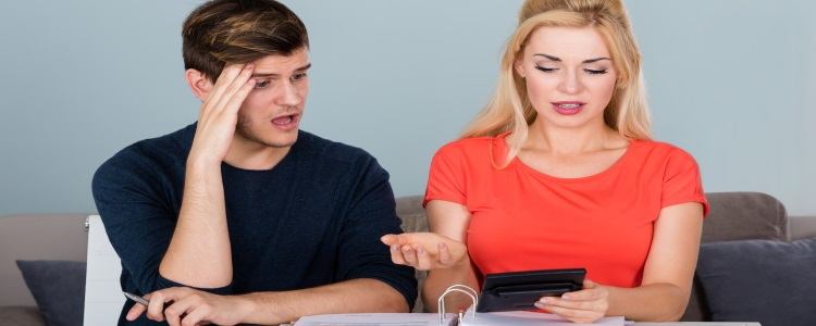 couple confused at their budget, budgeting