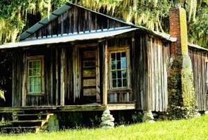 a small, remote cabin on stilt foundation