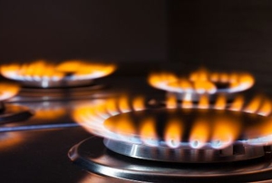 Flames shooting from stovetop burners