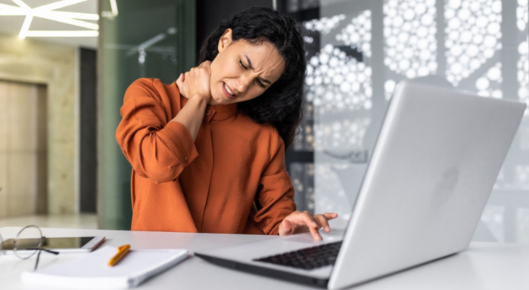 Woman deals with text neck.