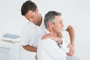 image of man getting adjusted.