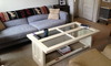 A coffee table made from reclaimed doors.