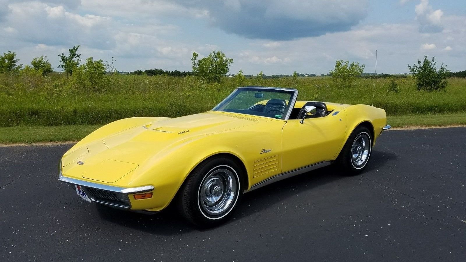 A yellow convertible.