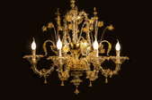 A chandelier on a black background.