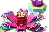 a brightly colored gift box with many unfolding layers