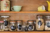 pantry shelves with labeled jars