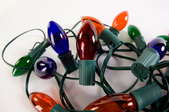 A tangled string of large-bulb Christmas lights.