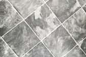 Vinyl tiles with a marble look.