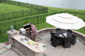 outdoor patio with kitchen, grill, and seating area