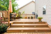 wood deck with lighted stairs