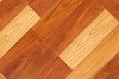 A close-up on a small section of hardwood floor.