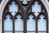 old fashioned church style window with elaborate window pane shapes