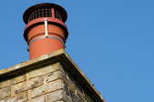chimney with old fashioned flue pot vent