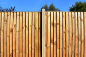 tall wood fence
