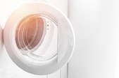 Light shining from an open dryer door