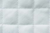 white quilted cotton