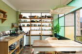 A sleek modern kitchen with lots of storage.