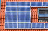 solar panels on a terracotta roof