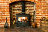 Wood stove as a fireplace insert