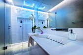 A sleek, ultra-modern bathroom.