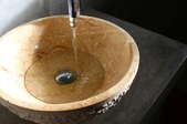 water flowing into a sink basin