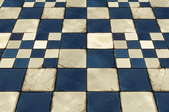 How to Reglue Linoleum Tiles