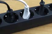white and black cords in surge protector