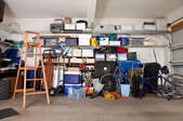 An organized garage with boxes and items. 