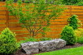 elegant garden fence with horizontal slats