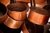 Pile of copper pots