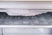 A close-up image of frost buildup in a freezer.
