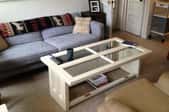 A coffee table made from reclaimed doors.