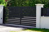 Black gate at the entrance to a home