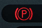 The parking notification on a dashboard. 