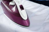 Ironing a white cloth