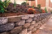 retaining wall retaining a flower bed