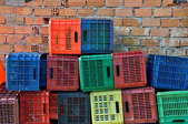 A stack of old milk crates, ready to be repurposed.