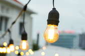 string lights with large bulbs in an outdoor space