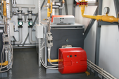 The gas boiler and other machinery in a room