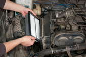Checking the air filter in a car engine