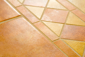 yellow and terra cotta colored floor tiles