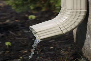 A downspout in need of an extension.