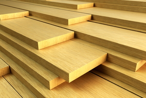 A close-up of a stack of lumber.
